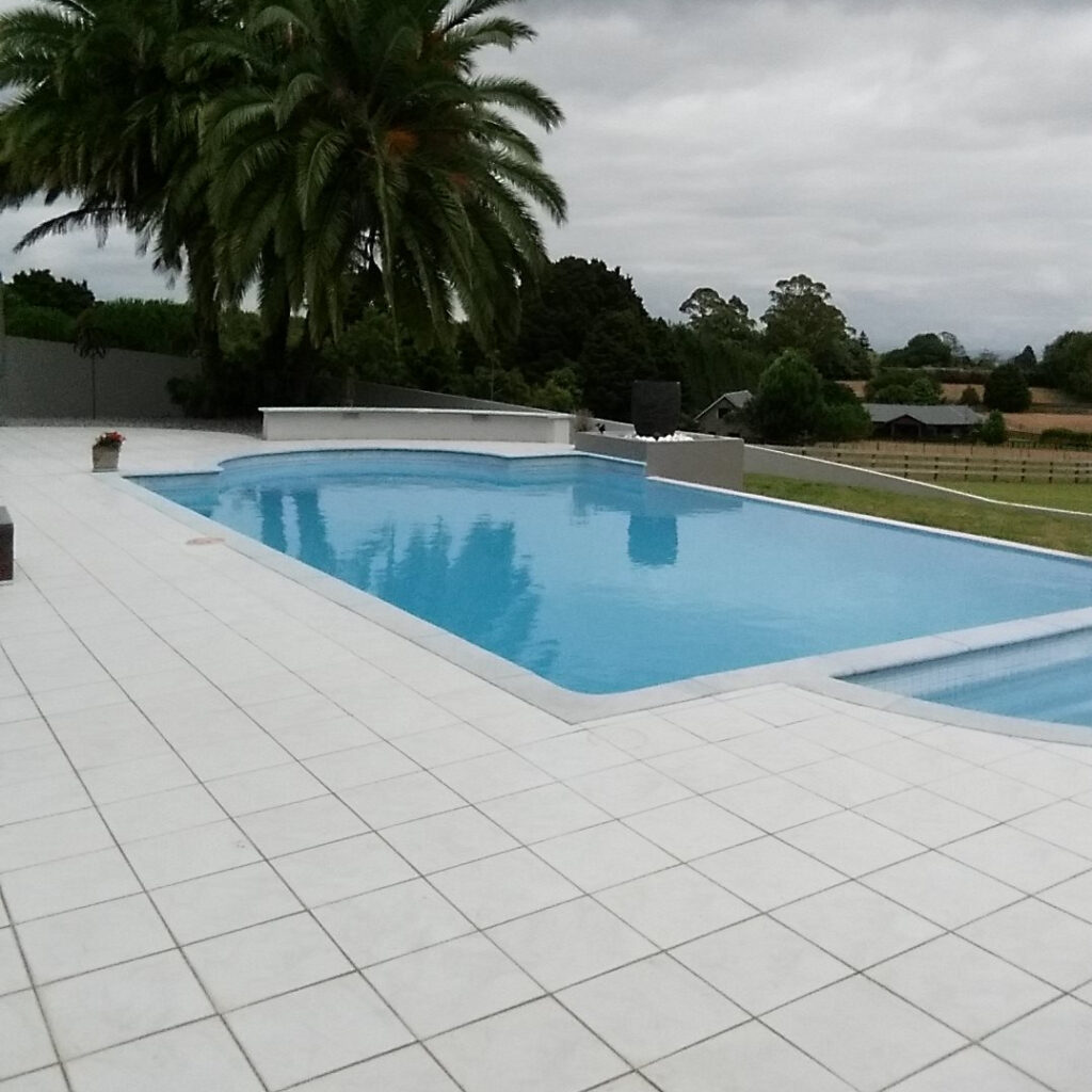 Natural tiles poolside